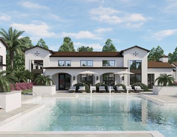 a house with a swimming pool in front of it at The Hadley Luxury Apartments, North Port, 34287